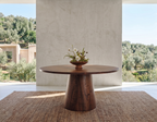 Table ronde en bois non massif et pied en cône