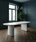 Table oval en microciment cirée et pieds demi lune