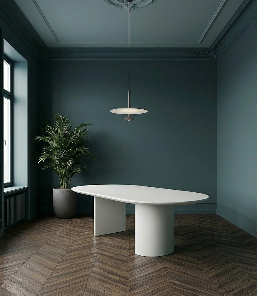 Table ovale en microciment ciré et pieds demi lune